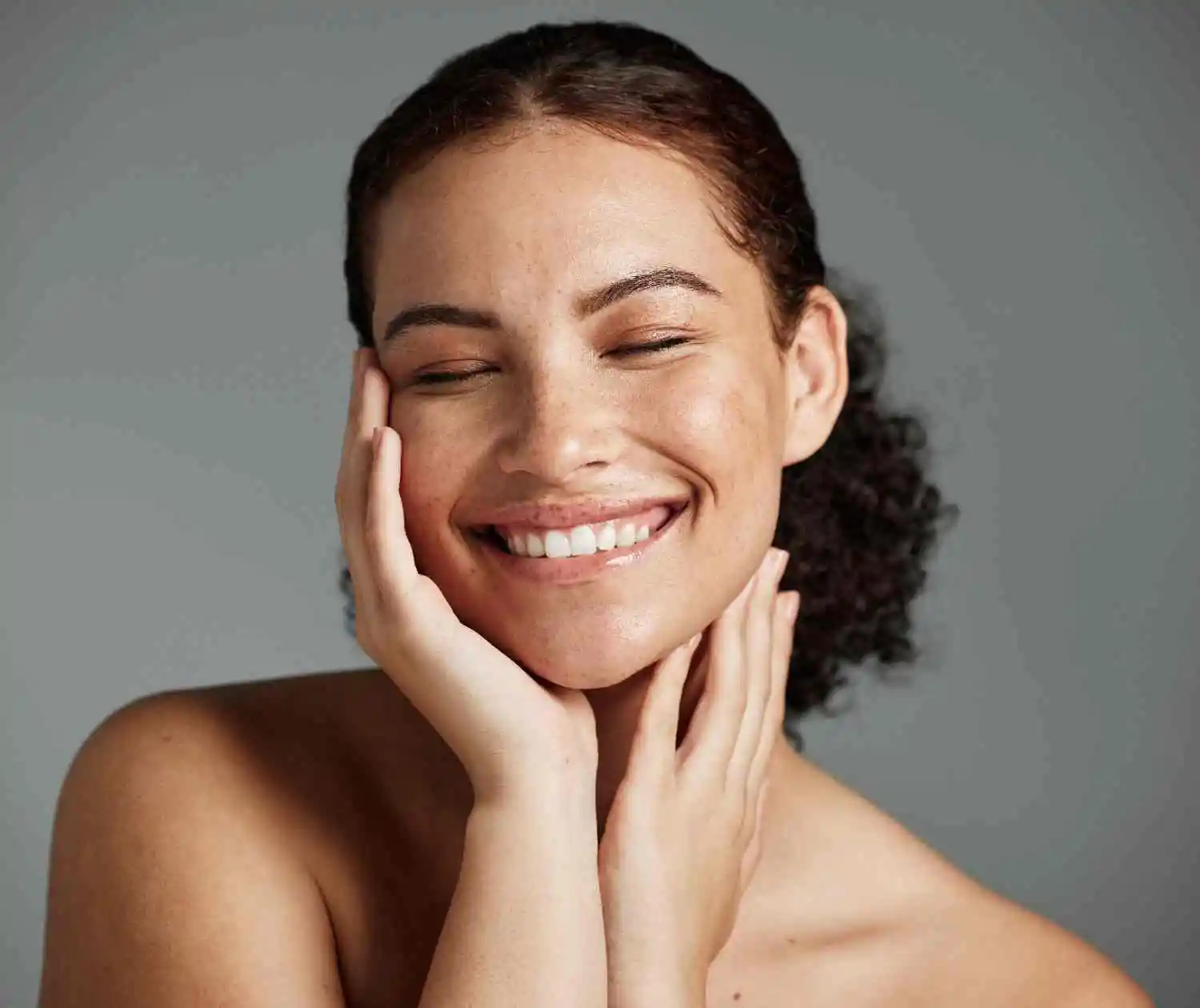 Woman glowing skin after medspa treatment under membership package