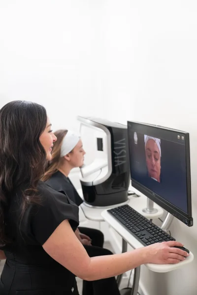 Pure Beauty Aesthetician doing Skin Analysis in Albany, OR